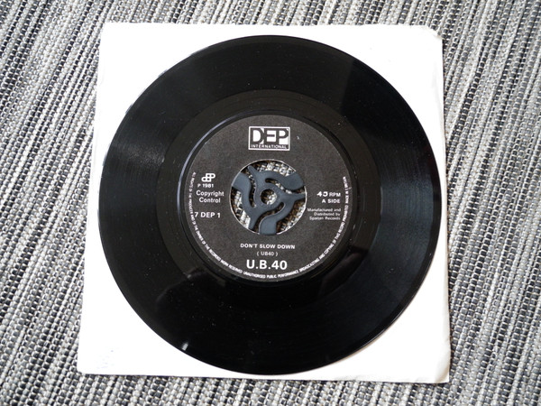 UB40 - Don't Slow Down / Don't Let It Pass You By - Used Vinyl Record image 1