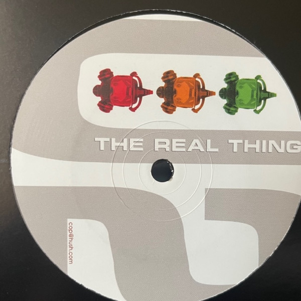 U2 - Real Thing 2006 Remix) - Vinyl Record 12" image 1