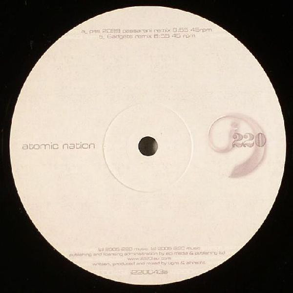 Atomic Nation - (Remixes) - Vinyl Record 12" image 1