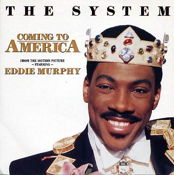 System - Coming To America - Used Vinyl Record 7" image 1