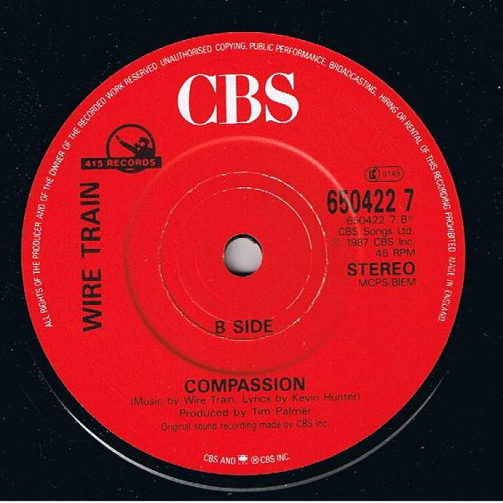 Wire Train - She Comes On / Compassion - Used Vinyl Record 7" image 4