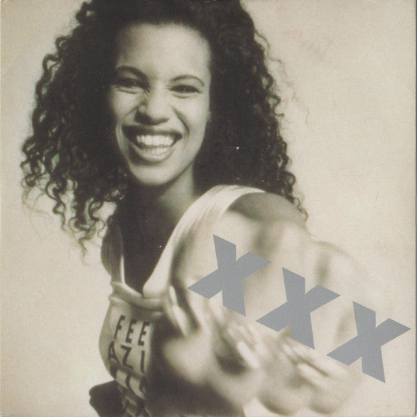 Neneh Cherry - Kisses On The Wind - Used Vinyl Record 7" image 1